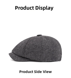 Side profile of a classic grey herringbone newsboy cap with textured tweed fabric