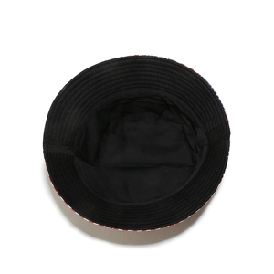Macro view of patriotic American flag print bucket hat showing black inner lining and stitching