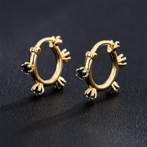 18K gold plated hoop earrings featuring sparkling dark blue zircon stones on black background