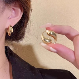 Minimalist thick gold teardrop hoop earrings for women with a high-polished metallic finish