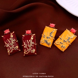 Vintage enamel rectangle drop earrings with gold plum blossom and pink cat eye stone
