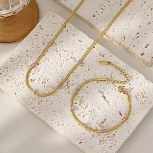 Elegant 18K gold plated snake chain necklace with pink square cubic zirconia on white stone
