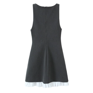 Sleeveless dark grey short dress with layered white ruffle hem and back zipper detail