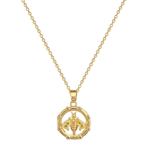 Luxurious gold round bee necklace with zircon pave stones on a classic O-link chain