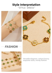 Close-up of gold plated enamel daisy bracelet with colorful flowers and lobster clasp