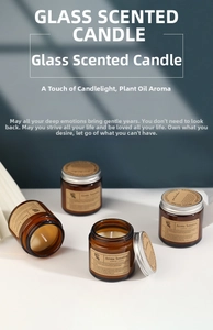 Detailed view of amber glass scented candles with metallic lids and kraft paper labels
