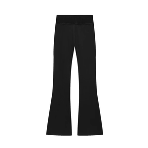 Detail view of high-waist black flared yoga pants with ribbed tummy control waistband