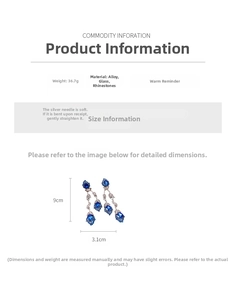Detailed view of blue rhinestone flower earrings with alloy and glass tassel specs