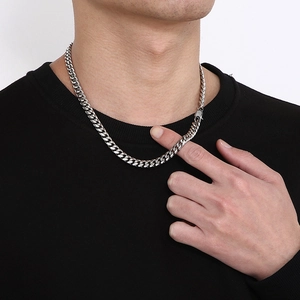 Minimalist silver stainless steel Cuban link necklace for men and women on model