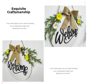 Detail of wooden welcome sign with burlap bow, pine needles and daisies decor