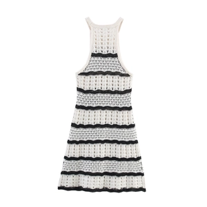 Detailed view of the striped hollow knit fabric on this elegant A-line summer dress