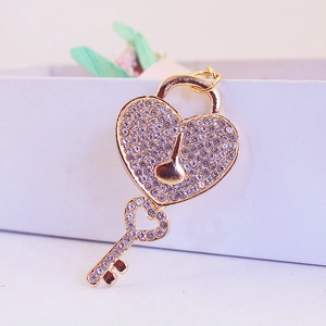Sparkling rhinestone heart lock and key keychain in gold finish for car keys and bags