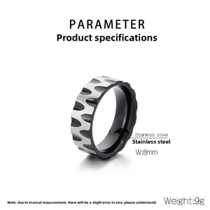 Macro detail of 8mm stainless steel ring with silver wavy texture and black polished edges