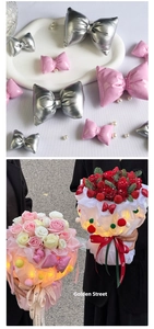 Close-up of metallic Christmas bow accessories used for elegant gift bouquet packaging