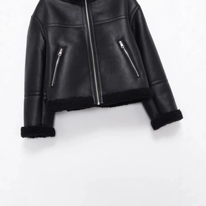 Women's black faux leather jacket with fleece lining and zip pockets in flat lay view