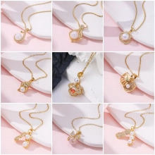 Detailed grid showing nine luxury gold-plated pendants with pearls and zircon stones