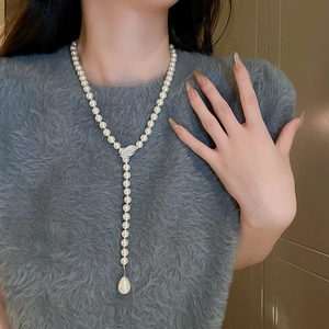 French vintage zircon leaf and pearl long necklace with elegant butterfly clasp detail