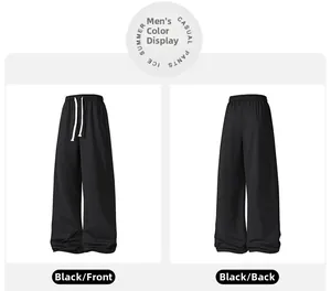 Front and back view of men's casual black wide-leg pants with elastic drawstring waist