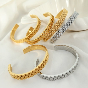 Watch band style open bangles in gold and silver finish on elegant white silk