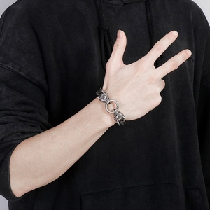 Close-up of vintage wolf head link bracelet in antique silver stainless steel for men