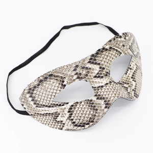 Detail shot of the snake skin pattern texture on the masquerade eye mask with elastic strap