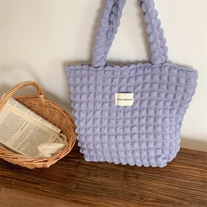 Detail of light purple popcorn fabric tote bag with a LOVE SOZAKKA woven label