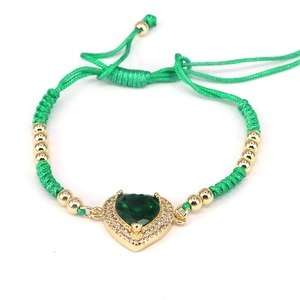 Braided green cord bracelet with heart-shaped green zircon and gold beads for women