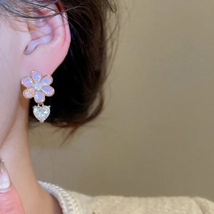 Elegant floral earrings with lilac petals and heart-shaped zircon crystal pendants