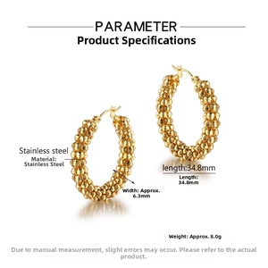 Detailed view of gold stainless steel hoop earrings with granular texture and dimensions