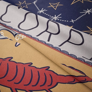 Detailed view of Scorpio zodiac tapestry fabric showing plush texture and vibrant colors