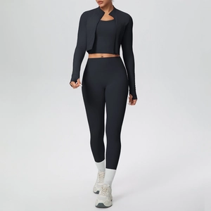 Three-piece charcoal sports set including a zip-up jacket, tank top, and leggings