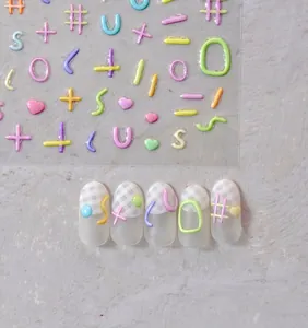3D embossed jelly nail art stickers featuring colorful macaron symbols and cream patterns