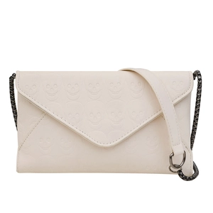 Ivory white skull-embossed envelope bag with a dark metal chain shoulder strap