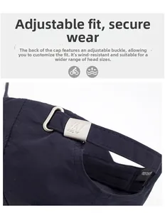 Close-up of the adjustable metal buckle on a navy blue breathable quick-dry baseball cap