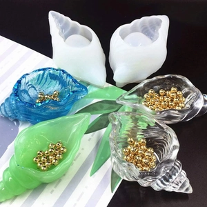 Dettagli degli stampi in silicone per candele a conchiglia e creazioni in resina finiti