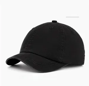 Side view of black washed cotton short brim baseball cap with twill fabric texture