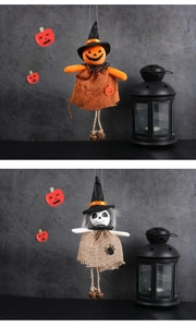 Detail of burlap Halloween hanging ornaments featuring pumpkin wizard and skull witch with bells
