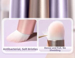 Detail of soft white mini lip brushes with rose gold ferrules and antimicrobial fibers