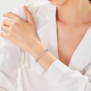 Close-up of double row tennis bracelet with pink and white crystals on a wrist