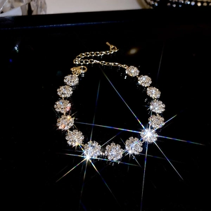 Sparkling gold-plated rhinestone bracelet set in a black velvet jewelry box for women