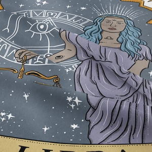 Close-up detail of Libra zodiac tapestry showing purple robe and golden scales print
