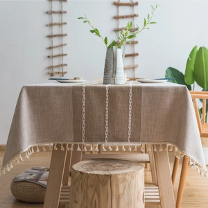 Waterproof linen-style tablecloth with brown stripes and decorative tassel edges