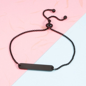 Detail of black stainless steel bar bracelet with adjustable box chain and slider clasp