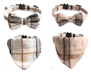 Detail of plaid pet collar and triangle scarf set with safety buckle and bell