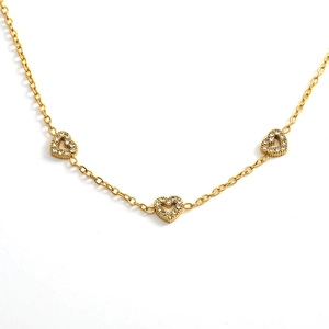 Elegant gold titanium heart necklace with hollow pendants and sparkling cubic zirconia