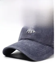 Macro shot of navy washed vintage baseball cap with white NY YORK embroidery and stitching