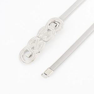 Close-up of silver metal elastic belt featuring a triple-ring intertwined twist buckle