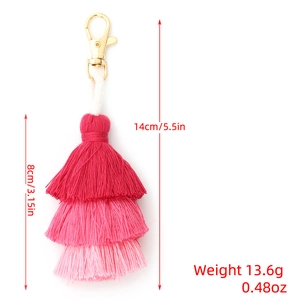 Three-layer gradient pink cotton tassel keychain with dimensions and weight measurements