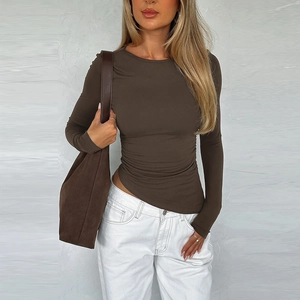 Slim fit brown long sleeve knit top with asymmetrical hem and classic round neck for women