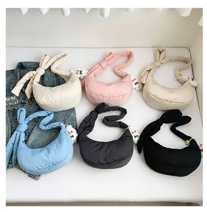Quilted crescent bags in six colors with knot straps and cute plush rabbit charms